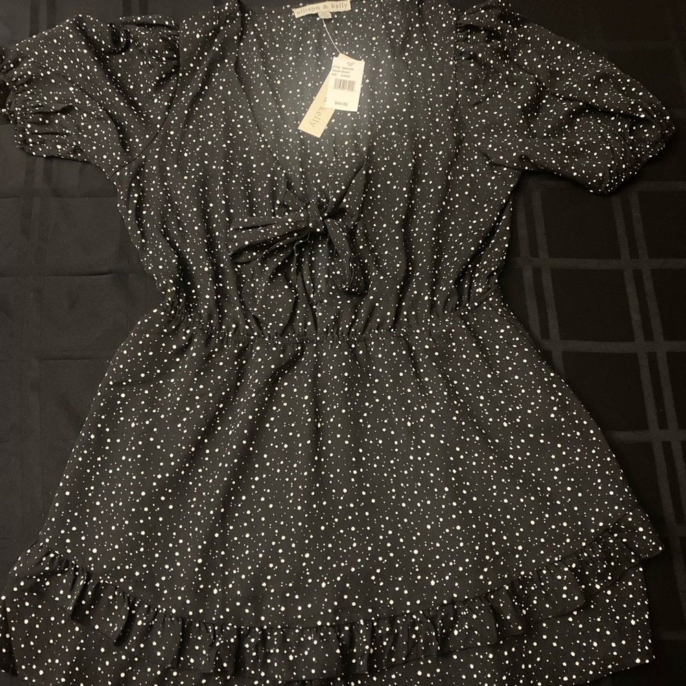 Super cute romper dress. It has shorts underneath.